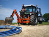 Digger Heckbagger beim baggern