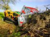 MDB Funkraupe mit Reisiggabel greift Reisig