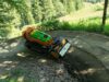 Steinfräse fräst Trail in Bikepark
